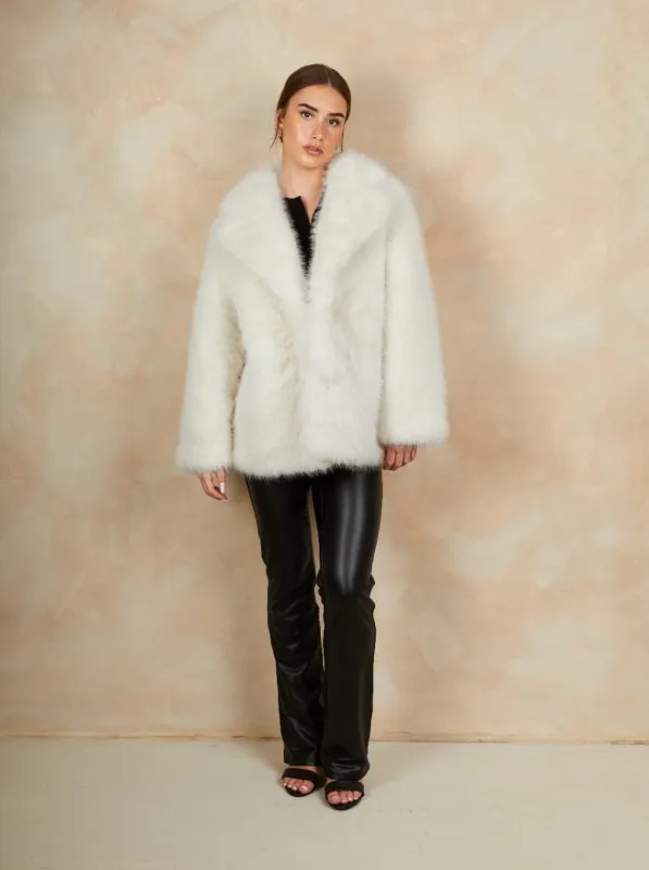 Faux Fur Mid Length Coat in Cream sold by Chi Chi London