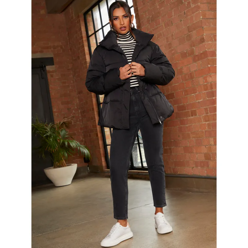 Chi Chi London Shirred Waist Short Padded Jacket in Black made by In the style