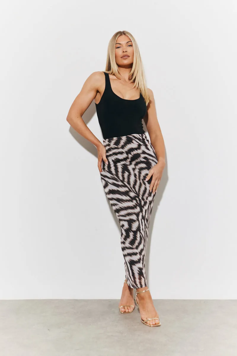 Magic Sculpting Printed Bodycon Midi Skirt sold by Chi Chi London