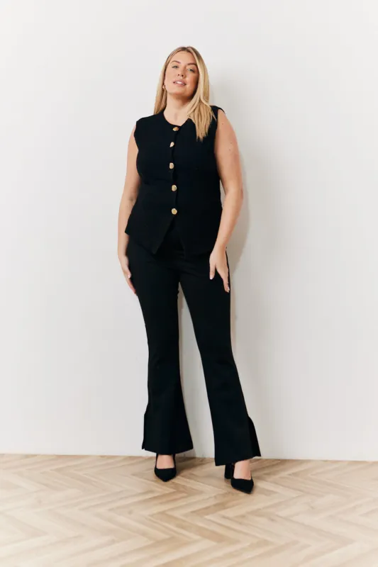 Occasion Black Flare Trousers made by In the style