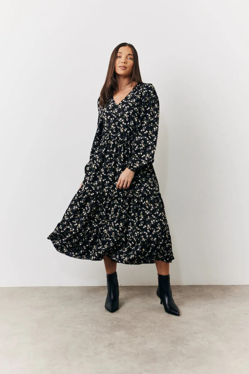 Black Ditsy Floral Printed Wrap Midi Dress sold by Chi Chi London