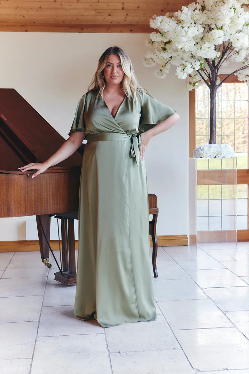 Olive Satin Wrap Tie Angel Sleeve Maxi Dress sold by Chi Chi London