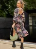 Long Sleeve Cut-Out Detail Floral Print Midi Dress in Black sold by Chi Chi London