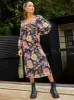 Long Sleeve Cut-Out Detail Floral Print Midi Dress in Black sold by Chi Chi London