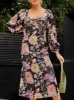Long Sleeve Cut-Out Detail Floral Print Midi Dress in Black sold by Chi Chi London