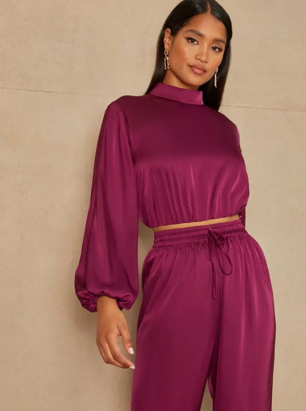 Long Sleeve High Neck Satin Top in Berry sold by Chi Chi London
