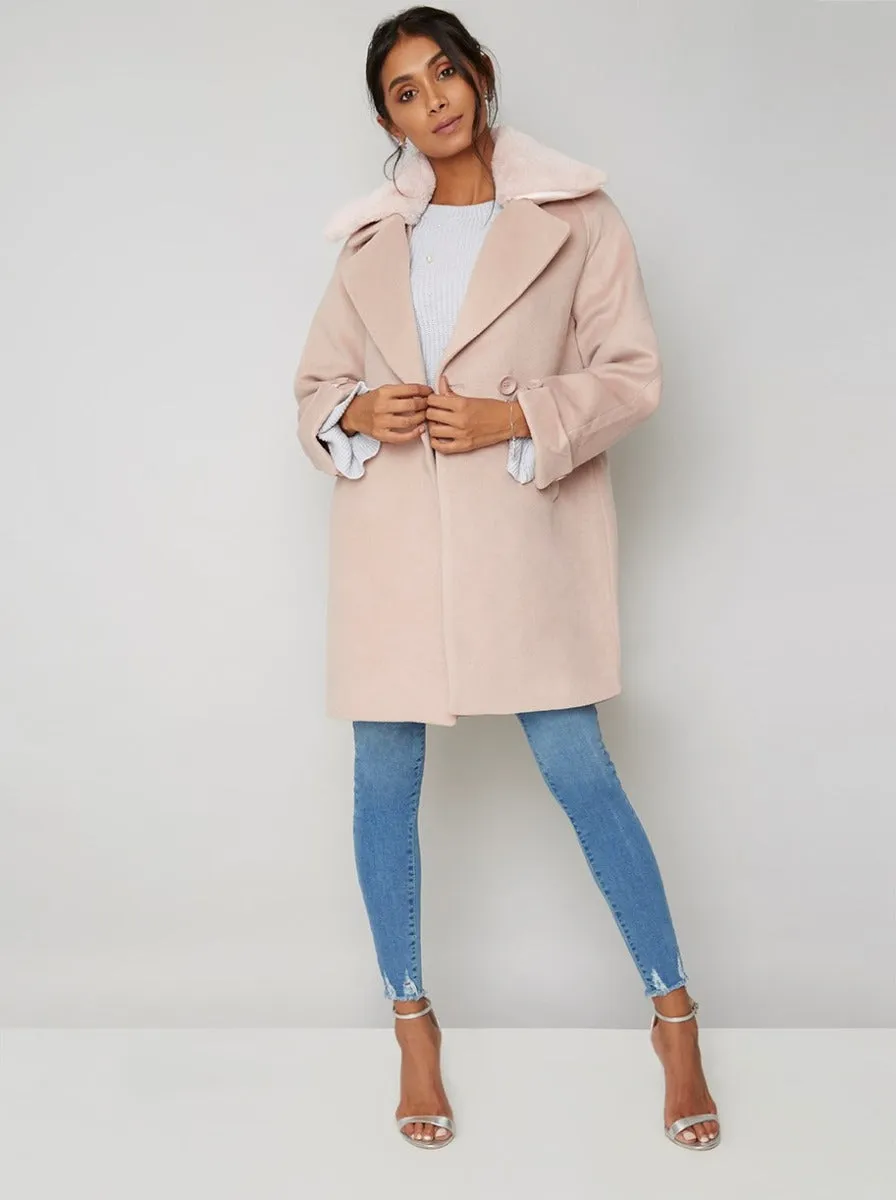 Faux Fur Collar Longline Coat in Pink sold by Chi Chi London