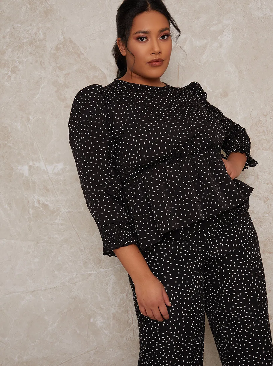Plus Size Polka Dot Peplum Top in Mono sold by Chi Chi London