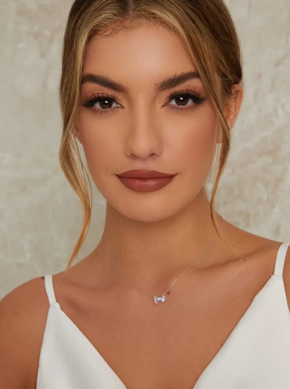 Diamante Bow Detail Necklace In Silver Tone sold by Chi Chi London