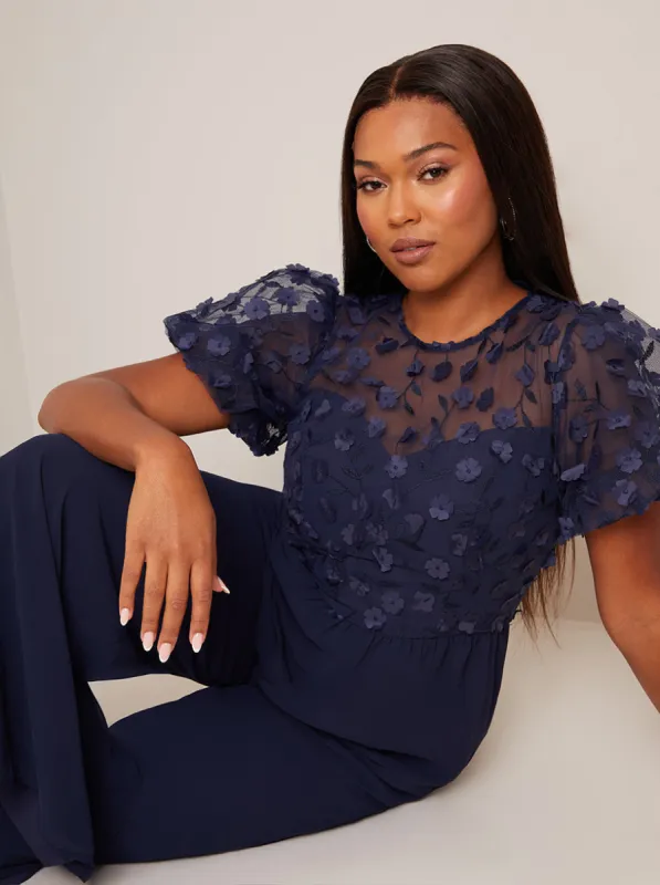 Flutter Sleeve Lace Wide Leg Jumpsuit in Navy sold by Chi Chi London
