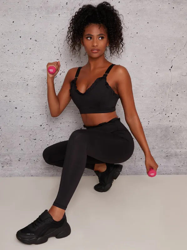 Sports Bra with Frill Trim Details in Black sold by Chi Chi London