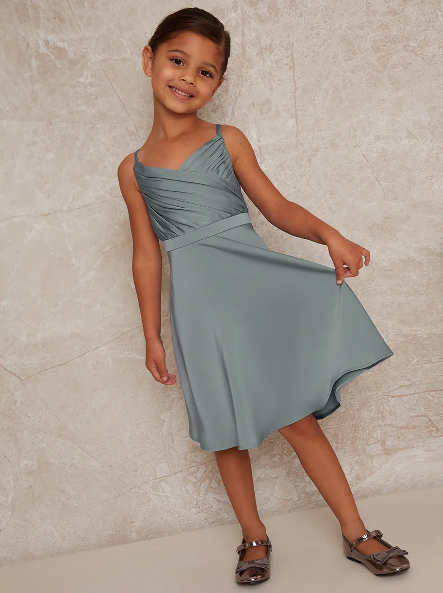 Girls Pleat Bodice Satin Finish Dress in Green sold by Chi Chi London
