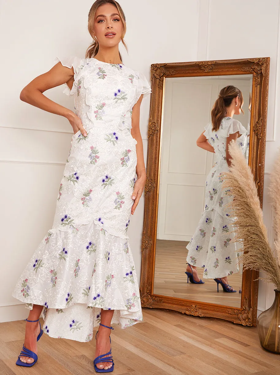 Ruffle Embroidered Maxi Dress in White sold by Chi Chi London