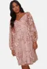 V Neck Long Sleeved Mini Dress in Blush sold by Chi Chi London