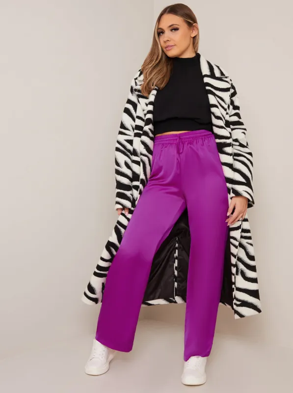 Satin Wide Leg Elasticated Waist Trousers in Fuchsia sold by Chi Chi London