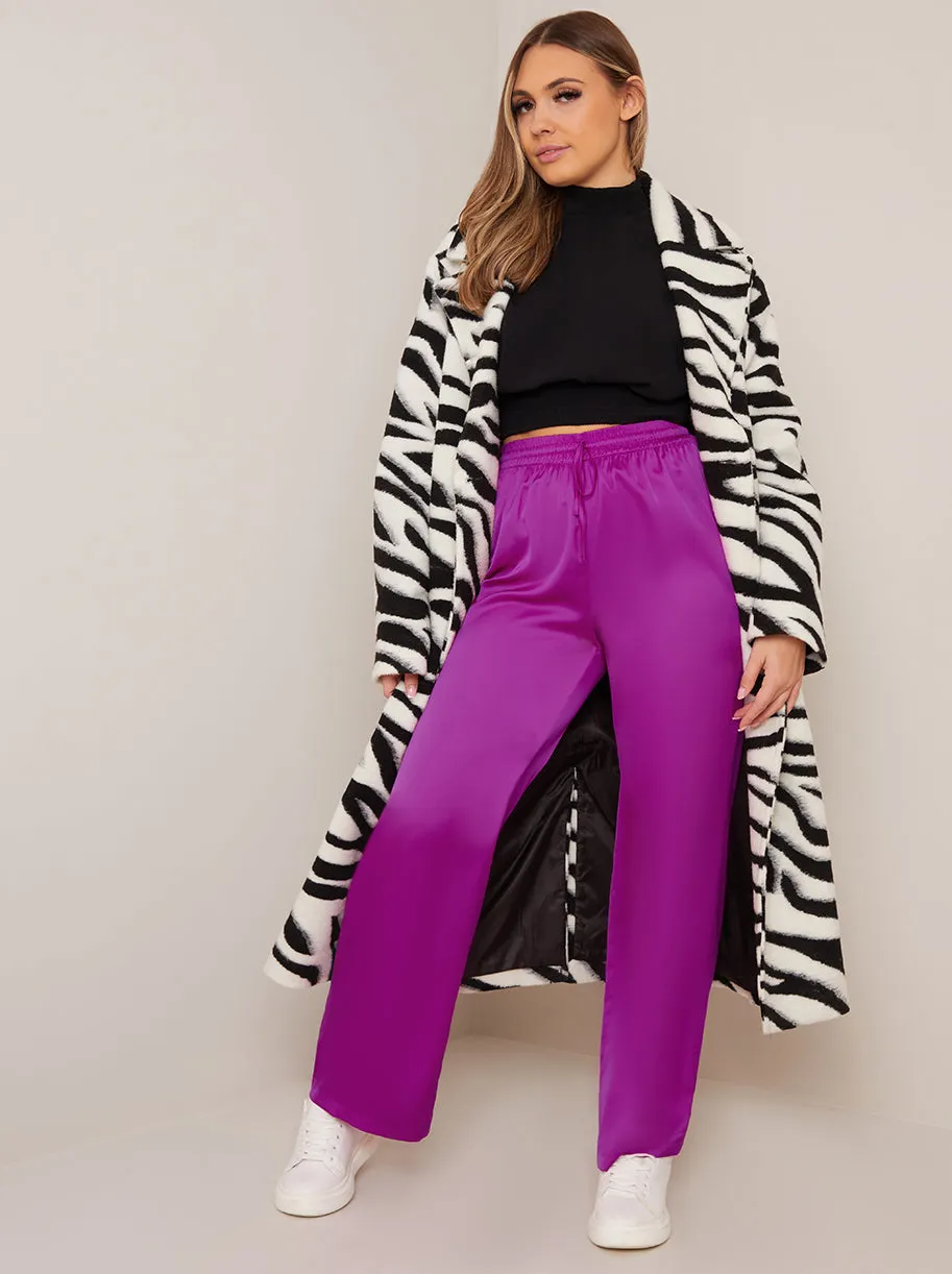 Satin Wide Leg Elasticated Waist Trousers in Fuchsia sold by Chi Chi London