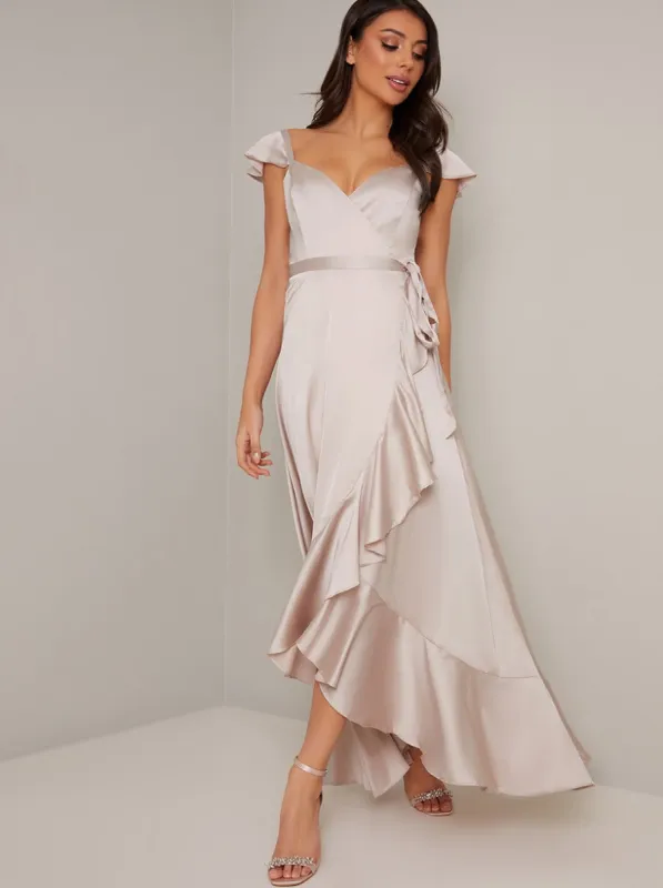 Wrap Design Frill Detail Dip Hem Dress in Neutral sold by Chi Chi London