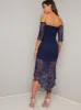 Bardot Long Sleeved Lace Bodycon Dip Hem Dress in Blue sold by Chi Chi London