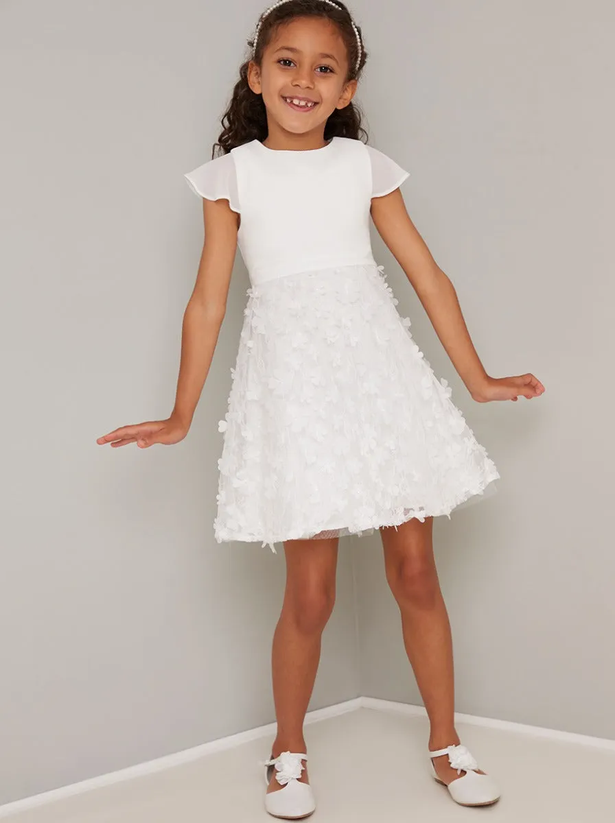 Girls Cap Sleeved 3D Floral Dress in White sold by Chi Chi London