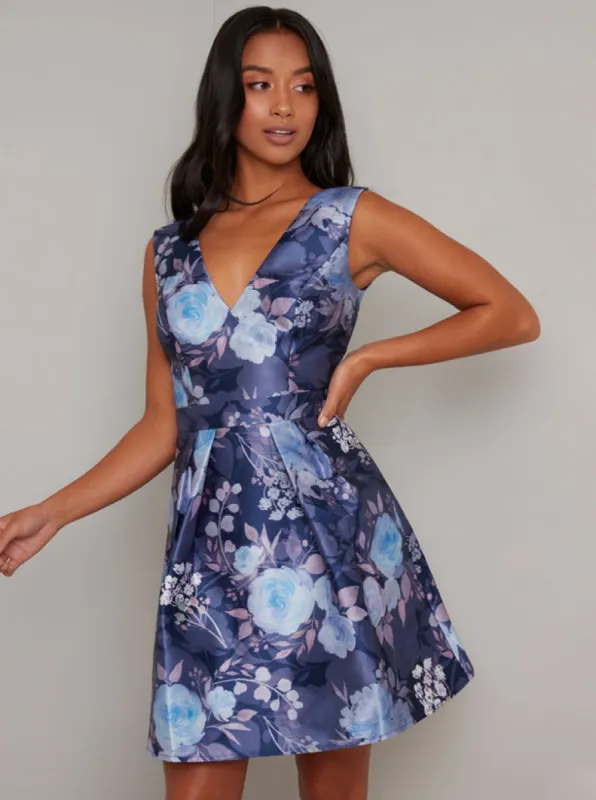 Petite V Neck Floral Print Mini Dress in Blue sold by Chi Chi London