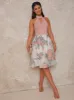Halter Neck Floral Print Skater Dress in Pink sold by Chi Chi London