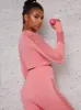 Eyelet Detail Long Sleeve Gym Top in Pink sold by Chi Chi London