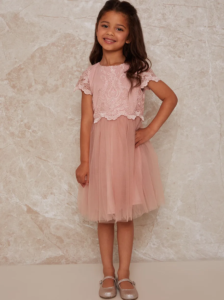 Girls Lace Overlay Dress with Mesh Skirt in Pink sold by Chi Chi London