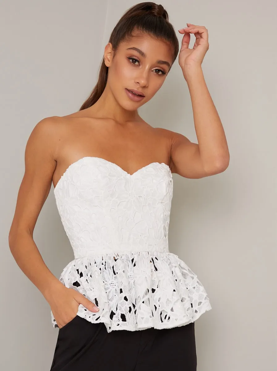 Premium Lace Peplum Hem Top in White sold by Chi Chi London