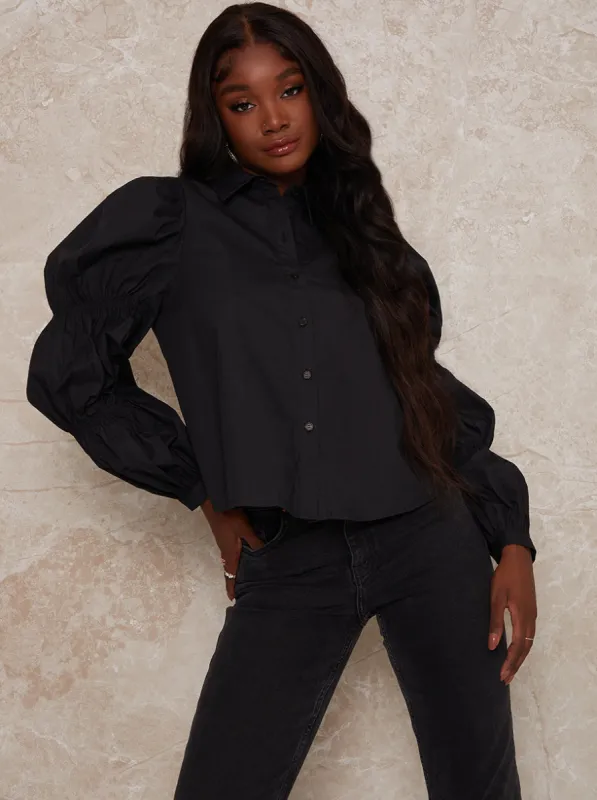 Exaggerated Puff Sleeve Cotton Shirt in Black made by Chi Chi London