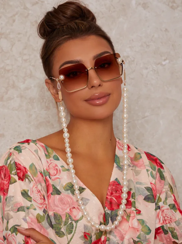 Large Pearl Sunglasses Chain in White sold by Chi Chi London