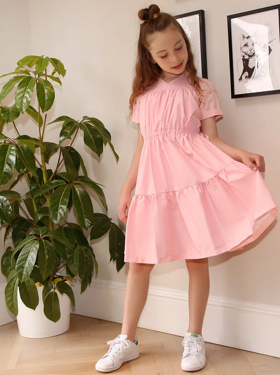 Girls Cap Sleeved Tiered Dress in Pink sold by Chi Chi London