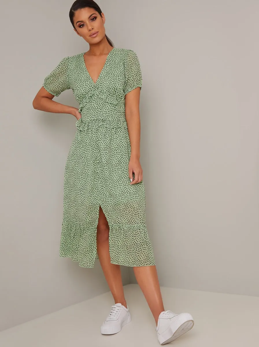 Spot Print Ruffle Detail Midi Dress In Green sold by Chi Chi London