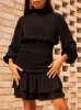Long Sleeve Top with Shirred Waist in Black sold by Chi Chi London