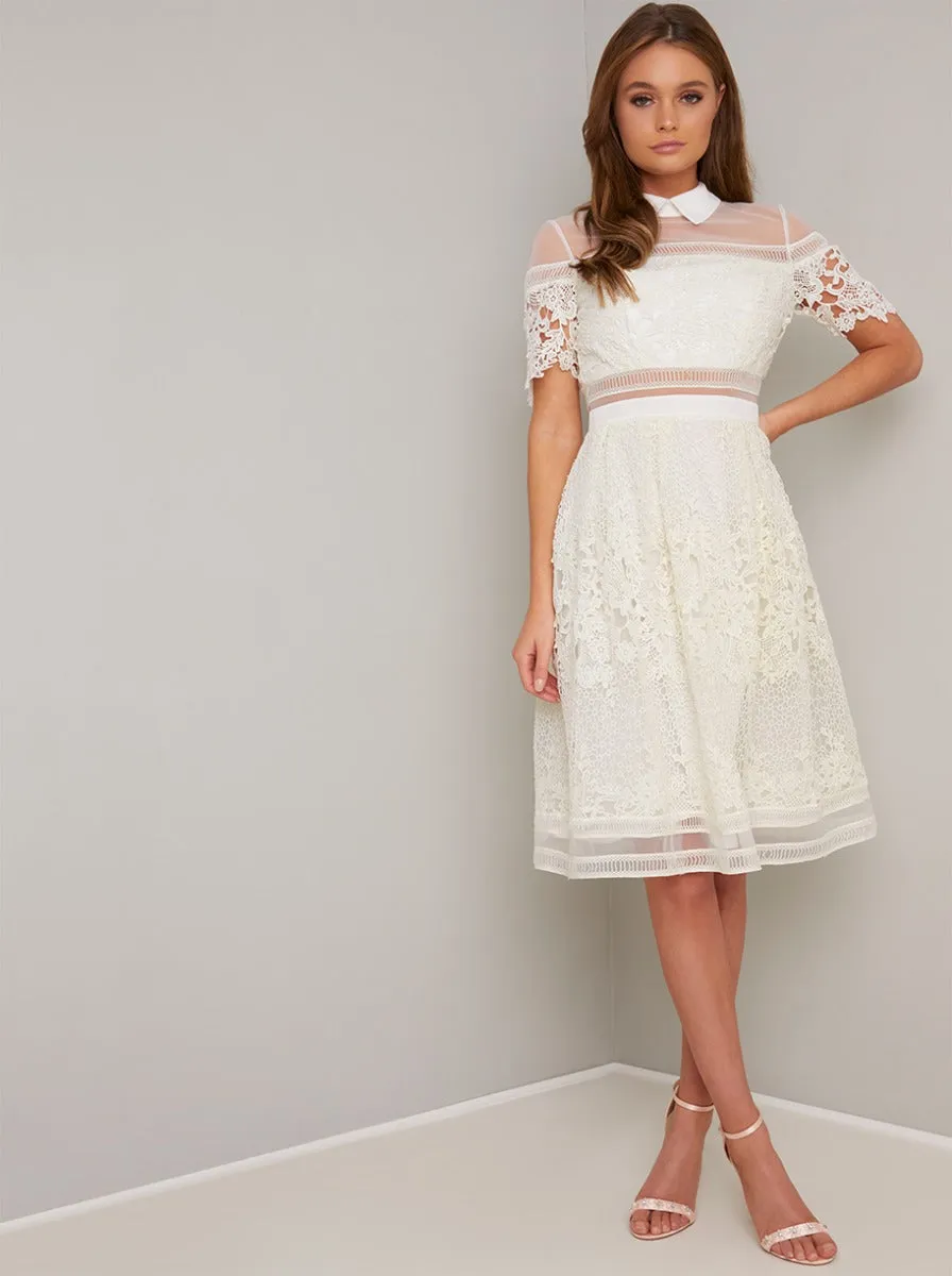 Collar Detail Lace Open Back Midi Dress in Cream sold by Chi Chi London