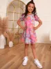 Younger Girls Puff Sleeve Floral Midi Dress in Pink sold by Chi Chi London