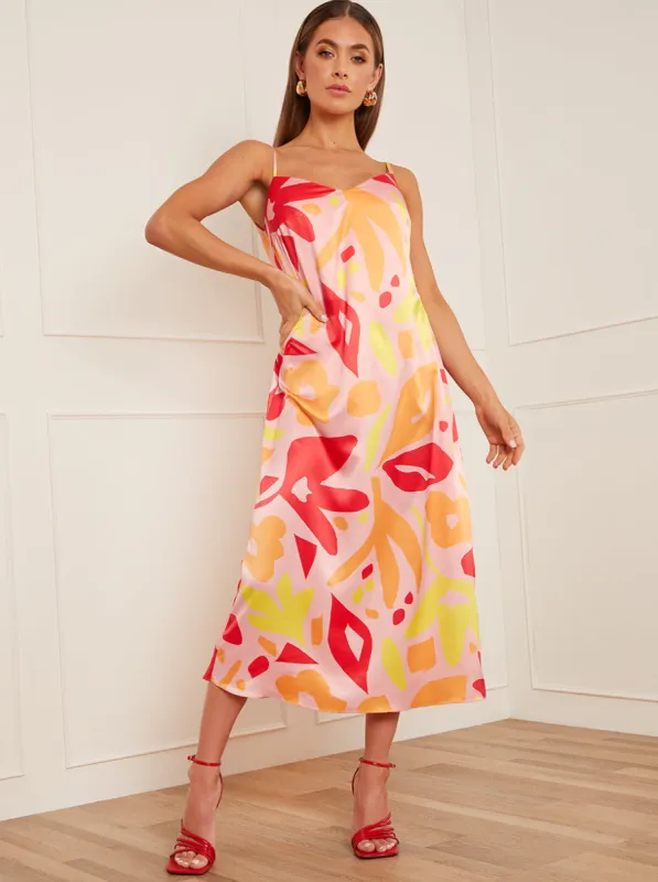 Abstract Print Midi Slip Dress in Orange sold by Chi Chi London
