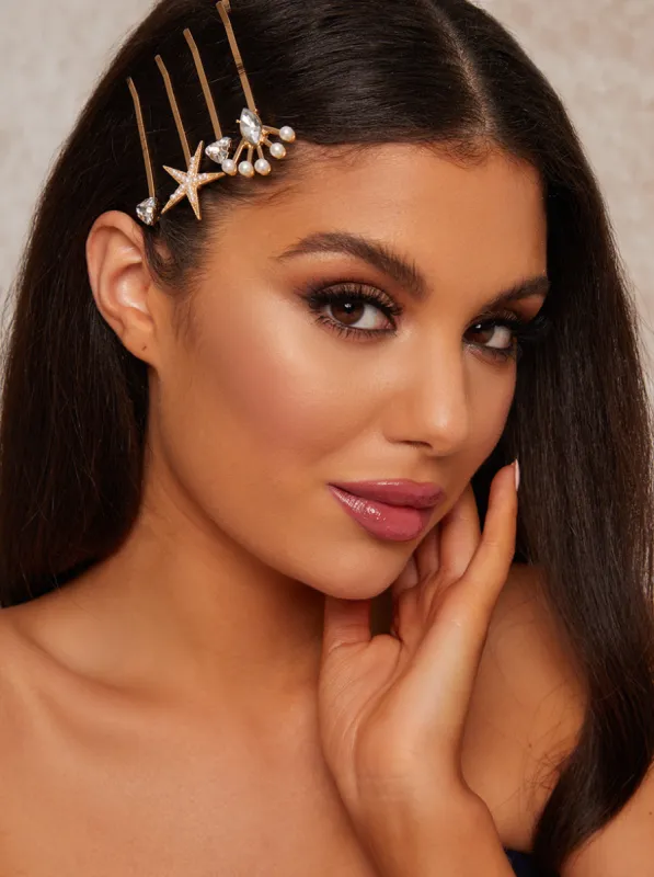 Star Hair Slides Pack Of 4 in Gold Tone sold by Chi Chi London