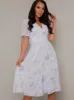 V Neck Short Sleeve Midi Floral Dress in White sold by Chi Chi London