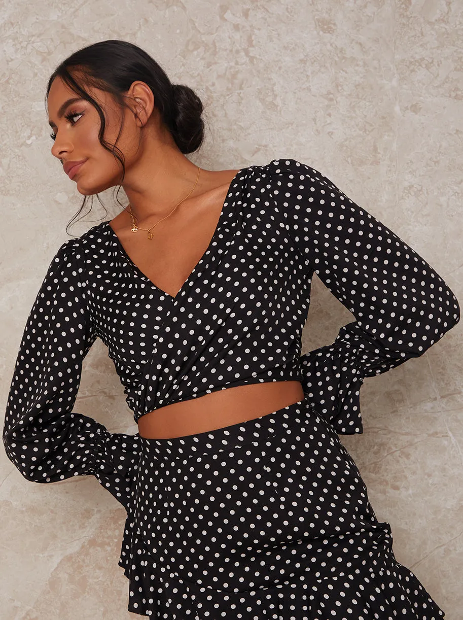 Long Sleeve Polka Dot Wrap Top in Black sold by Chi Chi London
