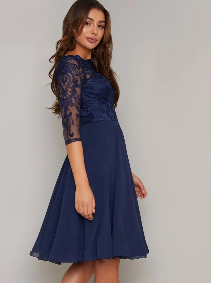 3/4 Sheer Sleeved Lace Bodice Midi Dress in Navy sold by Chi Chi London product image thumbnail 3