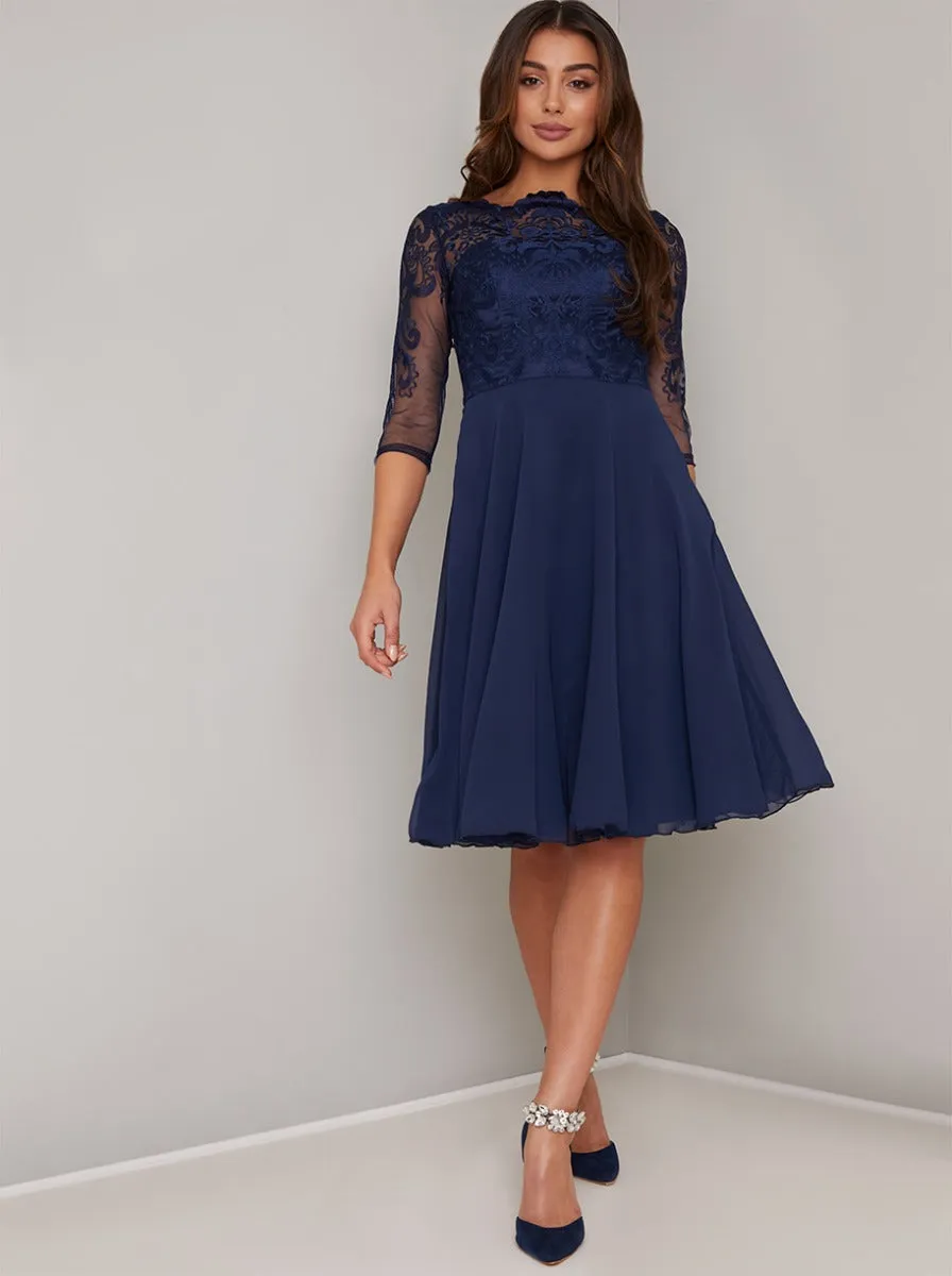 3/4 Sheer Sleeved Lace Bodice Midi Dress in Navy sold by Chi Chi London