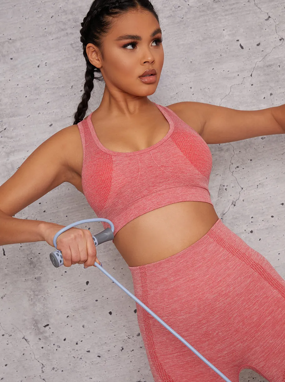 Racer Back Sports Bra with Contrast Piping in Pink sold by Chi Chi London
