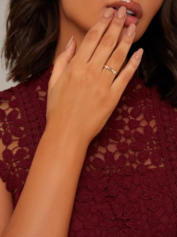 Triple Floral Ring in Gold Tone sold by Chi Chi London