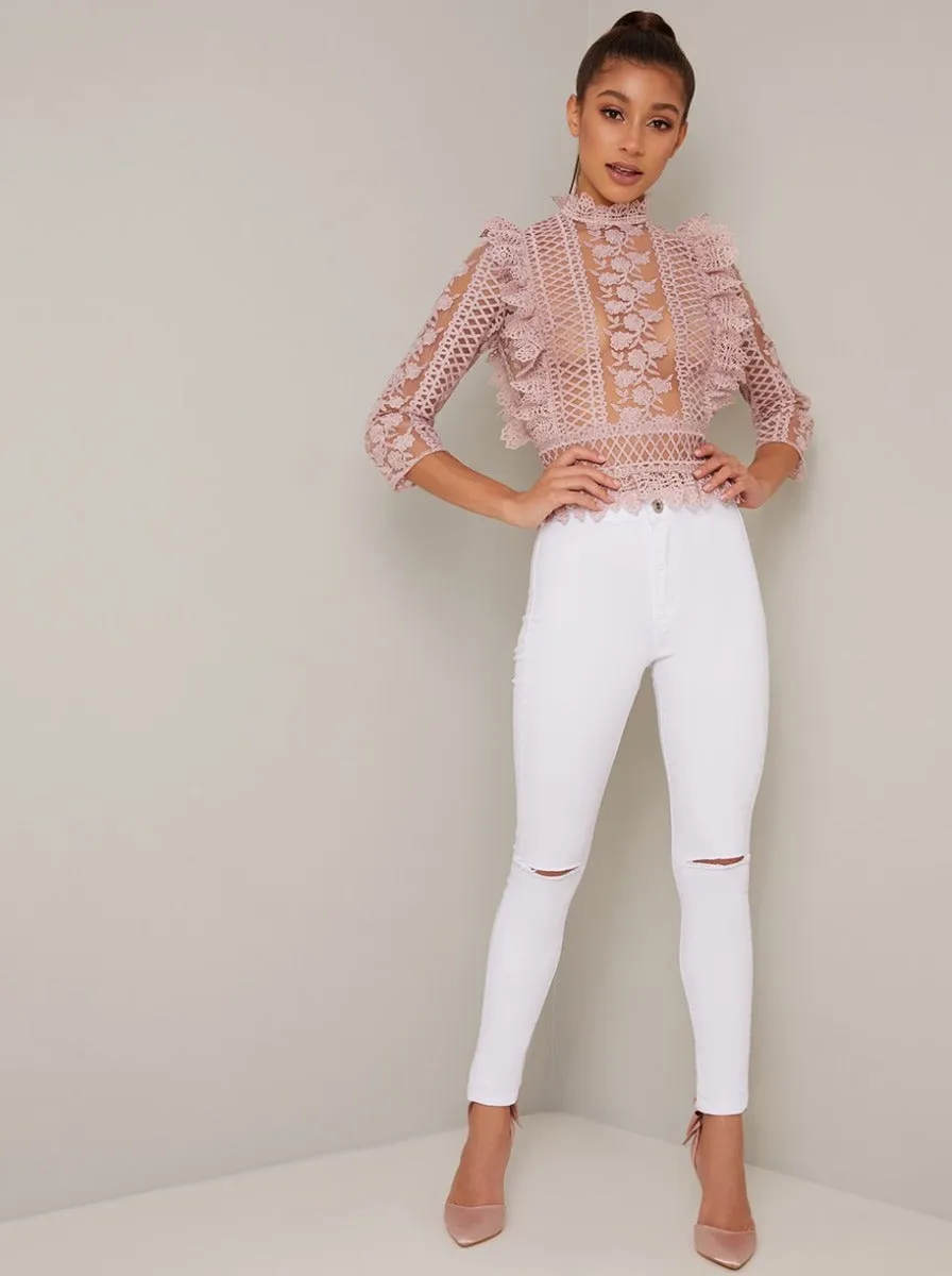 High Neck Sheer Crochet Lace Top in Pink sold by Chi Chi London