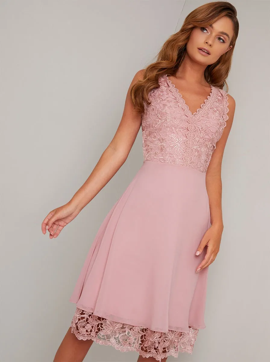Premium Lace Bodice Hem Detail Midi Dress in Pink sold by Chi Chi London