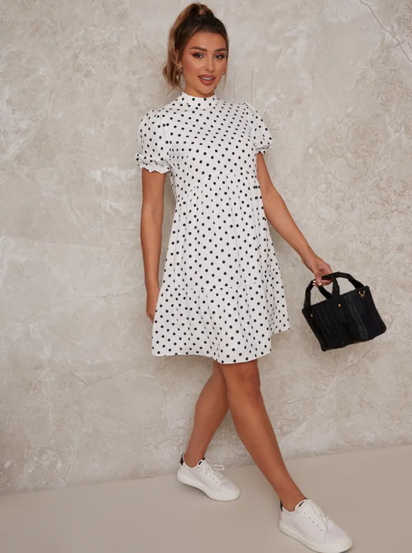Hi-Neck Polka Dot Print Tiered Mini Day Dress in White sold by Chi Chi London