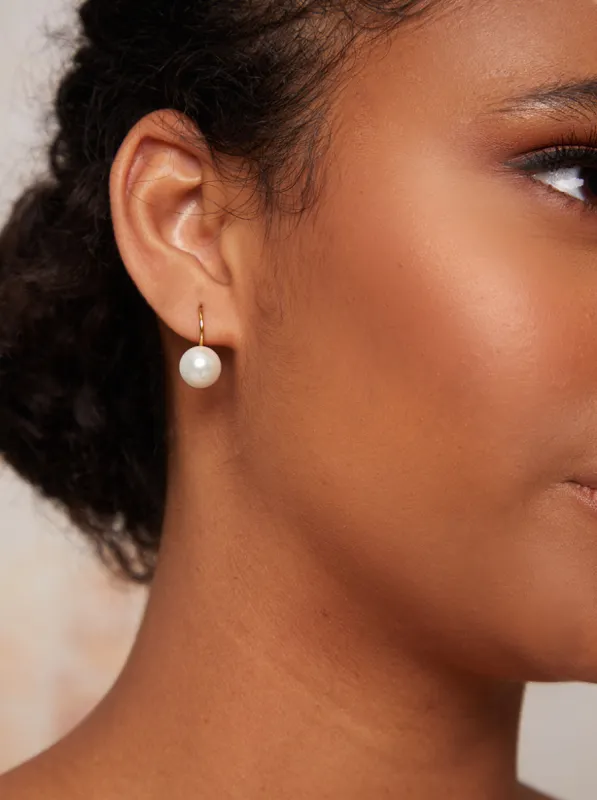 Pearl Drop Earrings in Gold sold by Chi Chi London