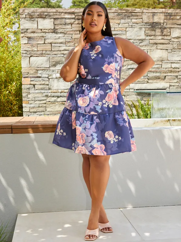 Plus Size Floral Printed Tiered Skirt Mini Dress in Navy sold by Chi Chi London