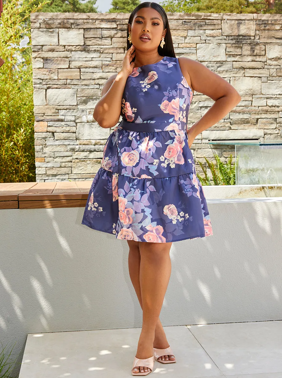 Plus Size Floral Printed Tiered Skirt Mini Dress in Navy sold by Chi Chi London
