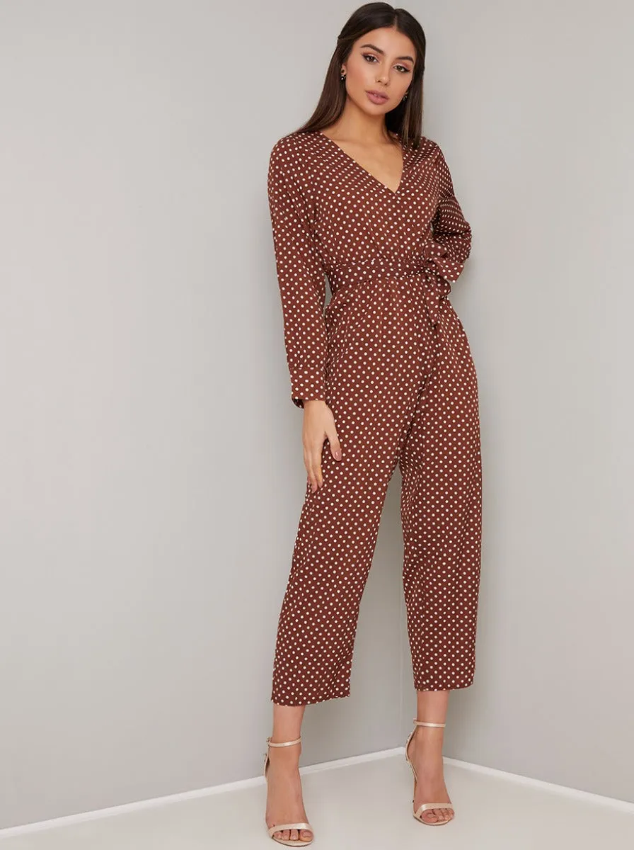 Polka Dot Long Sleeve Jumpsuit in Brown sold by Chi Chi London